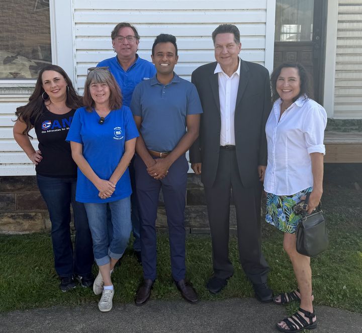 The OAMF team outside the barn before the East Palestine town hall — Stephanie Stock, Stephen Petty and volunteers