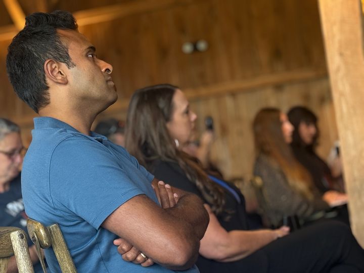 The audience listening at the Barn at Firestone Farms