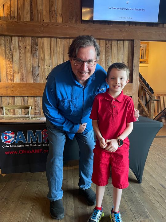 Scott Smith with a young supporter