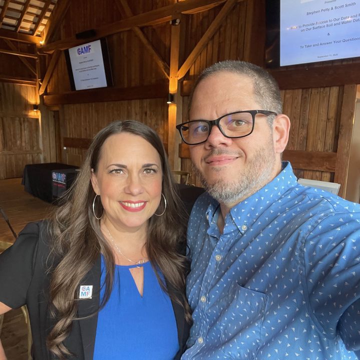 Stephanie Stock and a supporter inside the barn