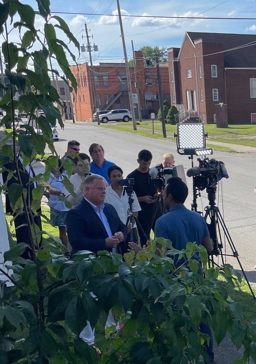 Cameras set up outside before the town hall